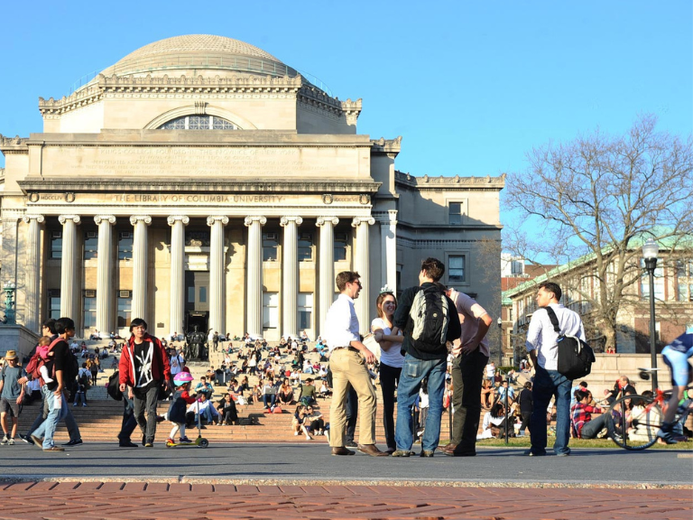 Photo of Low Library with students gathering on the steps and in the plaza