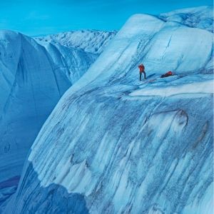 person standing on glacier