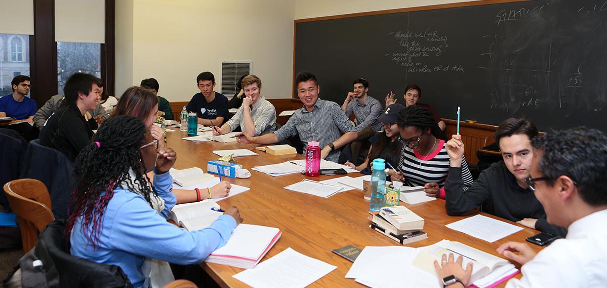 Professor Roosevelt Montas teaches a class. Credit: Char Smullyan