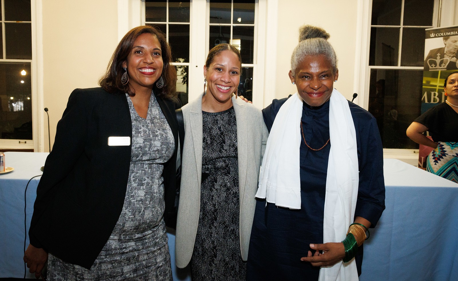 Adina Brooks, Carmela Alcantara, and Josefina Baez standing and smiling