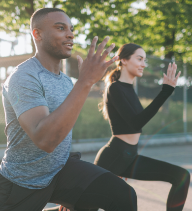 Explore Fitness Options with One Pass photo of man and woman doing lunge exercises