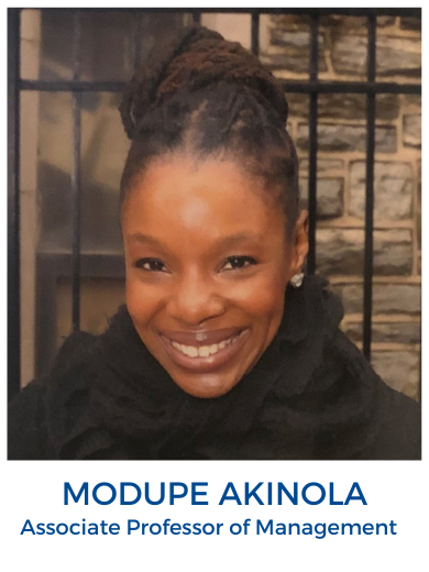 Head shot of Modupe Akinola wearing black shirt