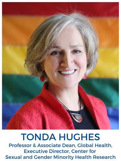 Head shot of Tonda Hughes in front of a rainbow pride flag
