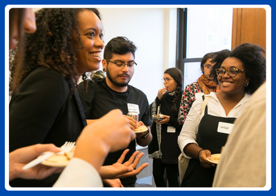 photo of people eating and laughing