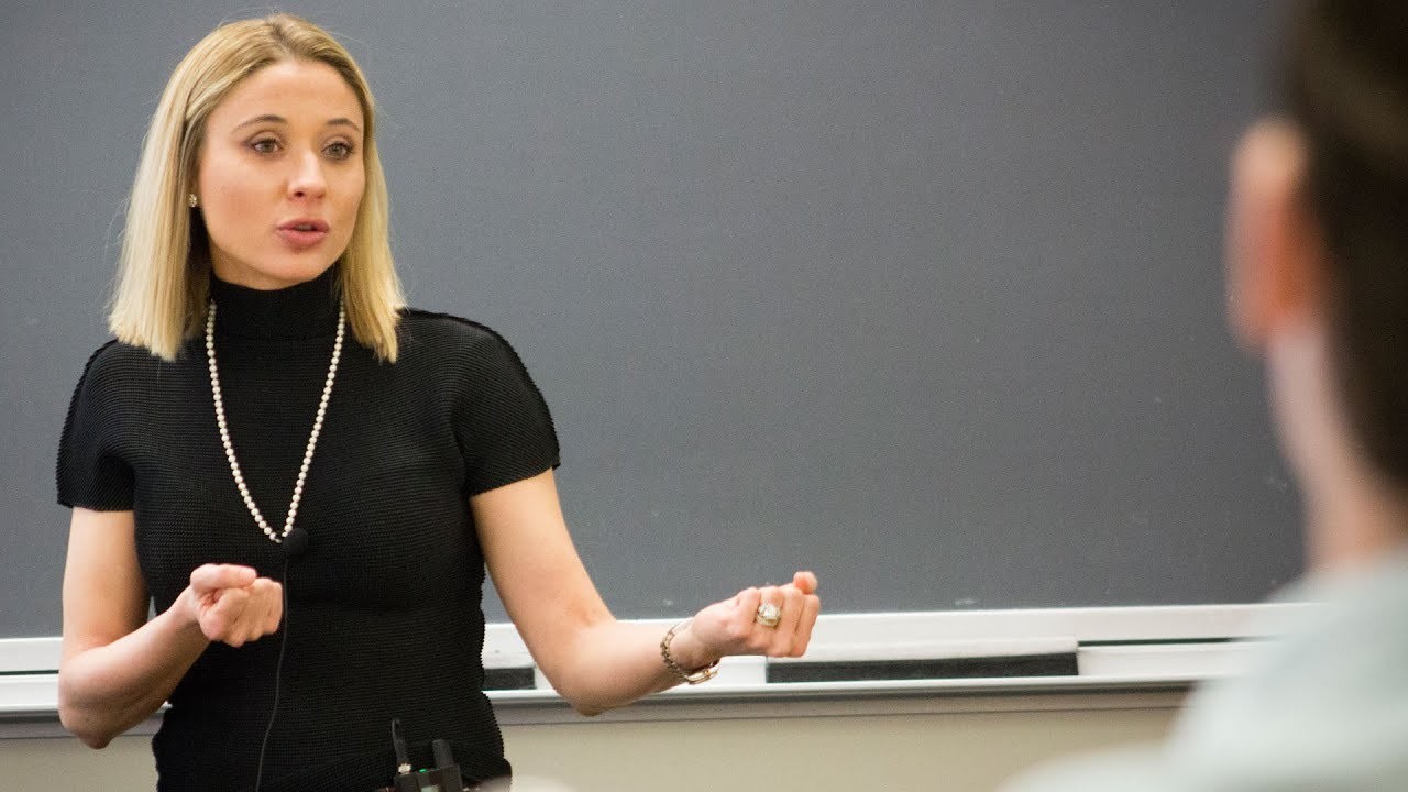 Piacentino teaching in front of blackboard