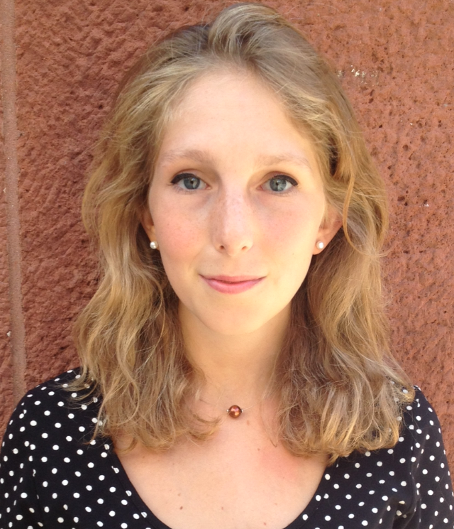 Head shot of Marianna Pecoraro with blonde hair and blue eyes wearing a polka dot shirt