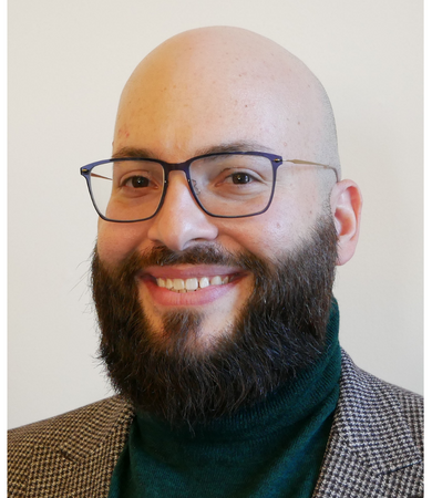 Head shot of Dror Levy wearing glasses and smiling