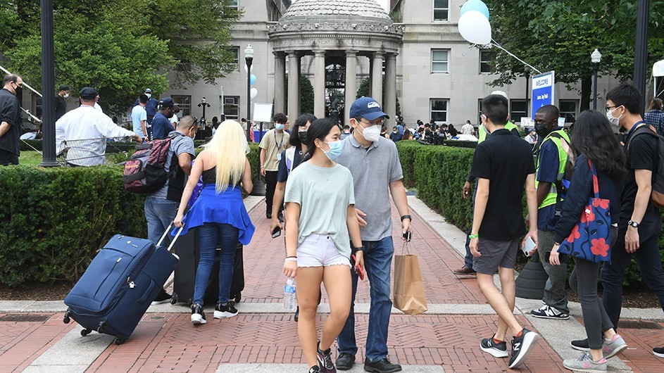 Masked students on College Walk