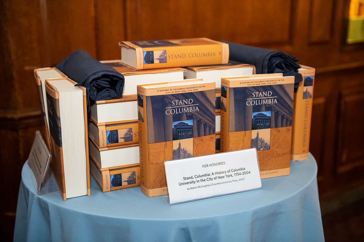 All newly tenured faculty were given a copy of Stand, Columbia, a history of the University Each newly tenured faculty member was given a copy of the book Stand, Columbia!, which chronicles Columbia University's first 250 years.