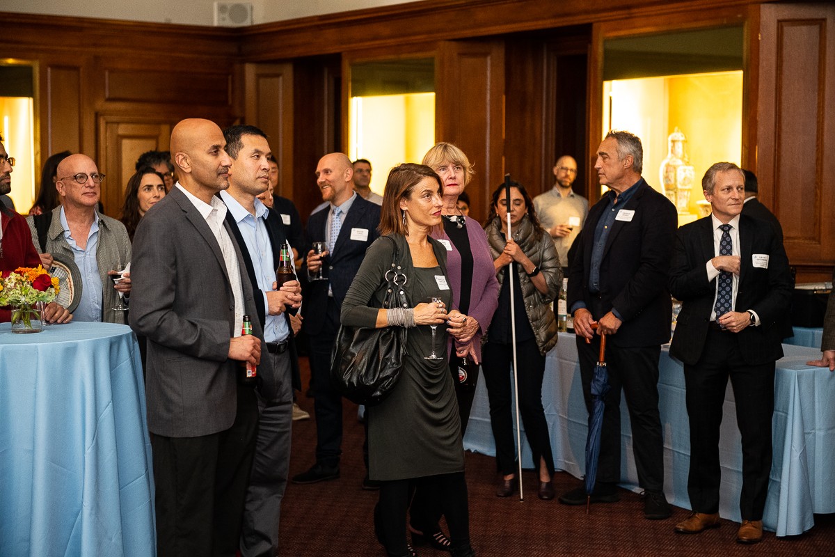 Guests at the Newly Tenured Faculty Reception listened to Provost Mary C. Boyce's welcoming remarks, which both congratulated the faculty and encouraged them to explore new frontiers in their scholarship. crowded room