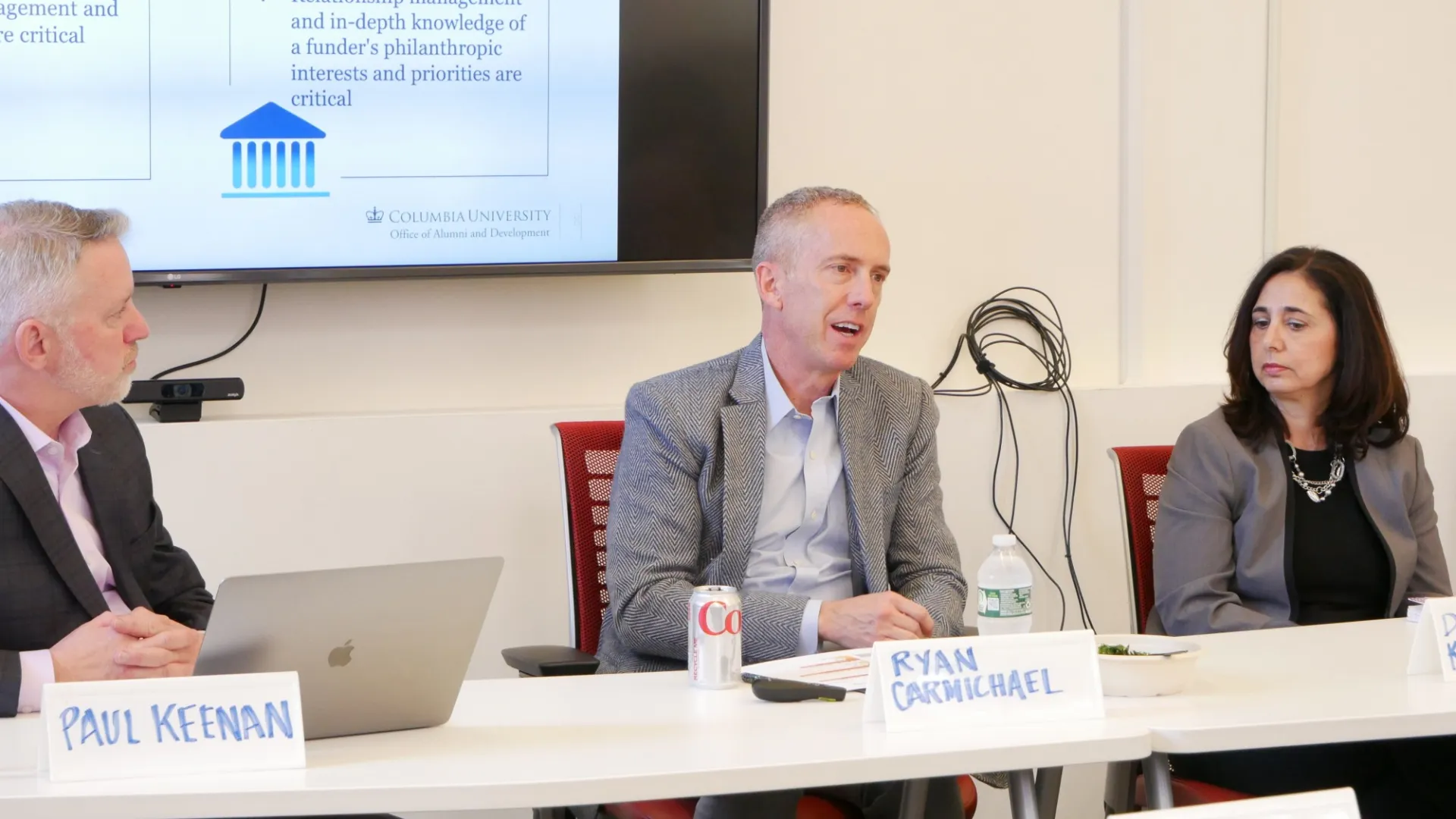 Photo of panelists Paul Keenan, Ryan Carmichael, and Dimitra Koutsantoni