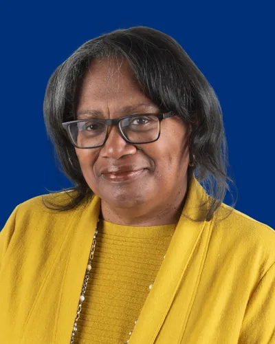 Photo of Brenda Jones Harden head and shoulders view. She is wearing rectangular glasses.