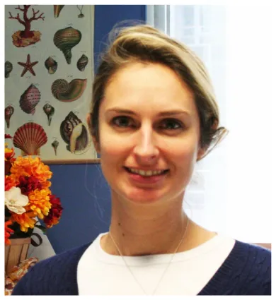 Head shot of Lydia Chilton with orange flowers