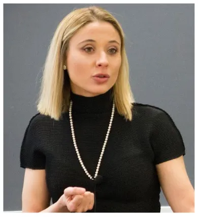 Head shot of Giorgia Piacentino wearing black turtleneck and pearls