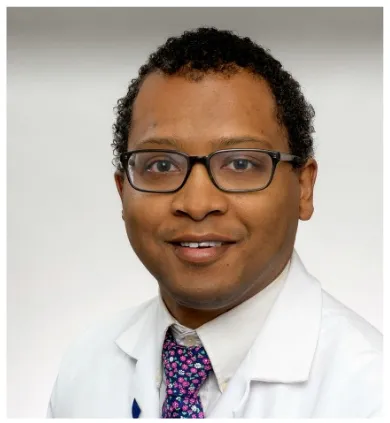 Raymond Givens head shot wearing lab coat