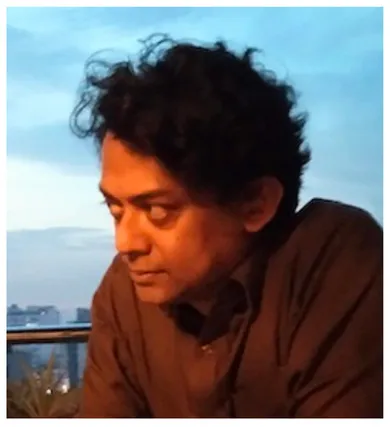 Photo of Naeem Mohaiemen, head and shoulders view