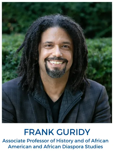 head shot of Frank Guridy against a green backdrop
