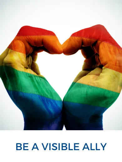 Hands in heart shape with rainbow