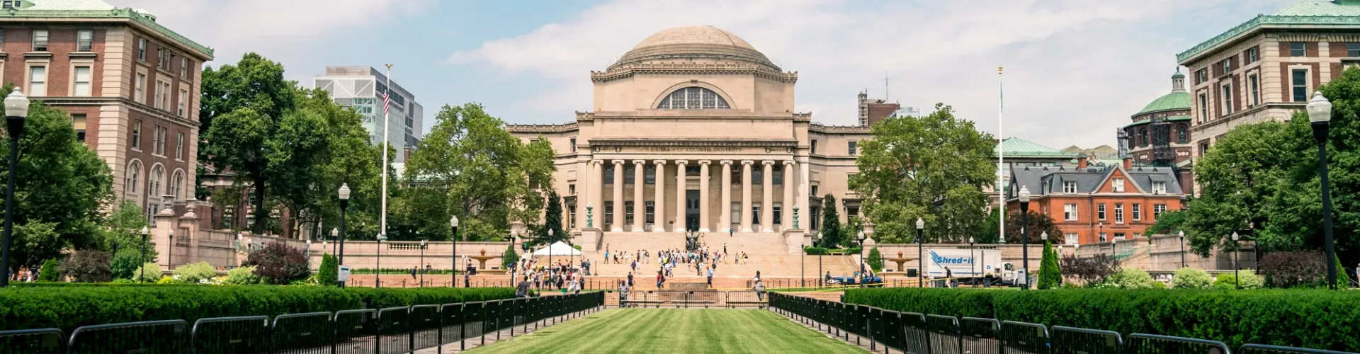 Low Library seen from the south with green grass and people on steps