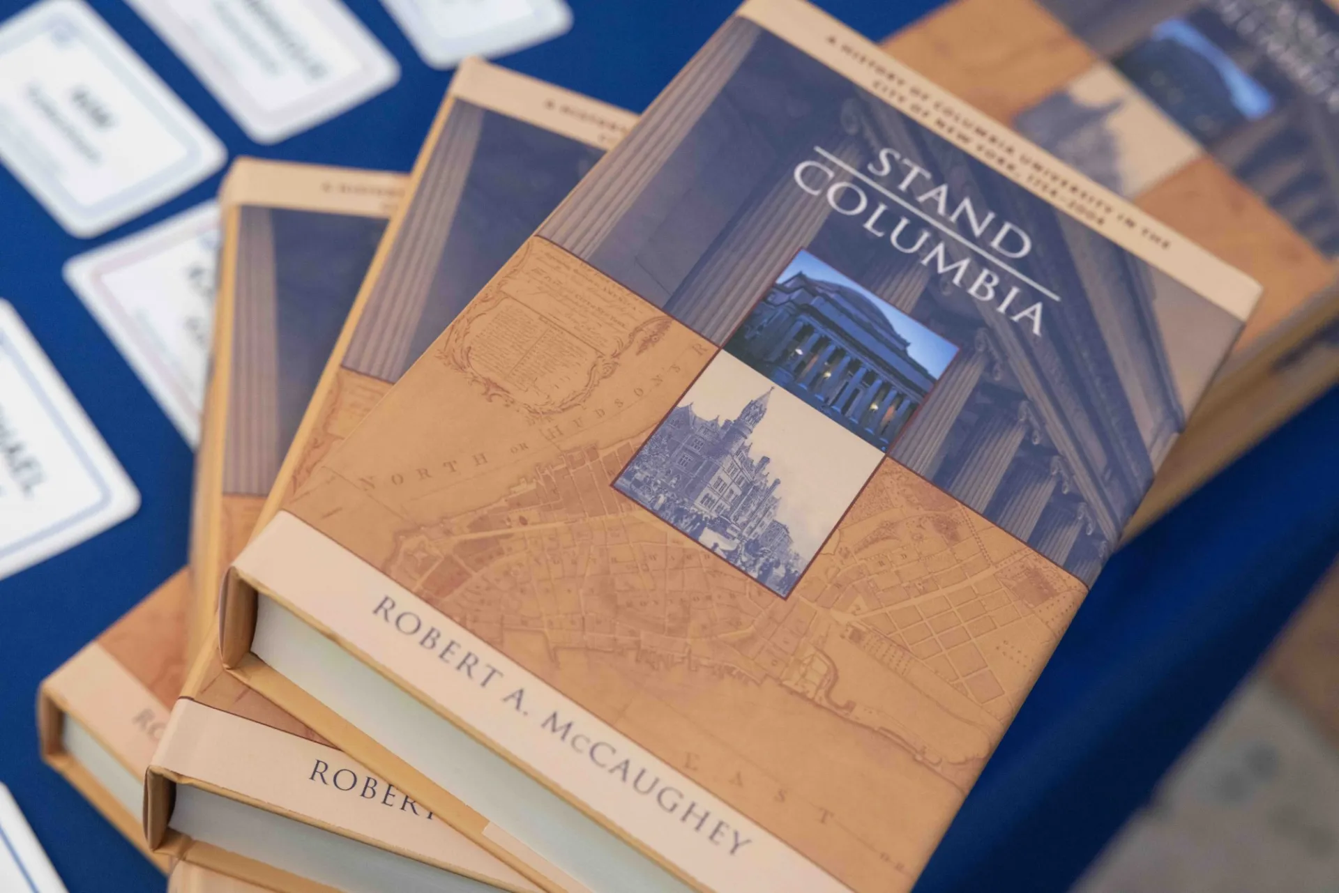 A stack of books on a table. 