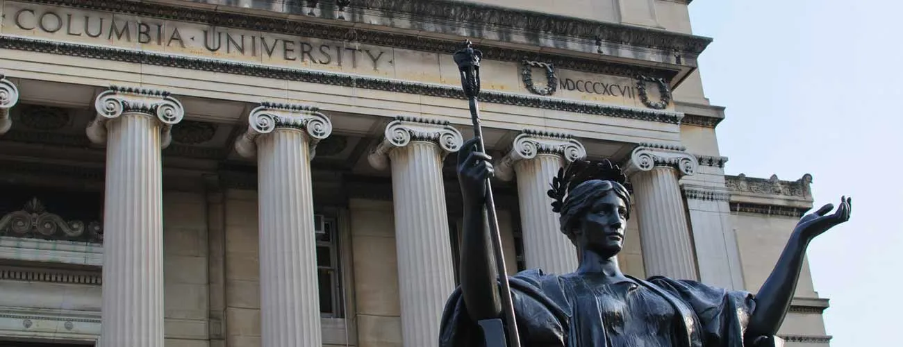 Angled view of the Alma Mater statue of the steps of Columbia University's Low Library